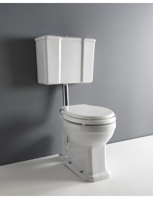 In Spanish, "Albano toilet med lav cisterne" translates to "Inodoro Albano con cisterna baja."